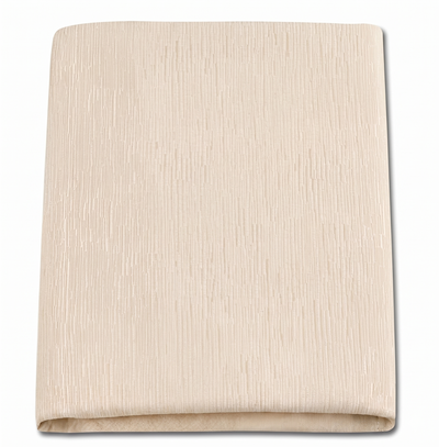 Beige folded fabric on a white background